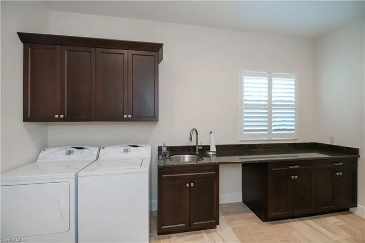 Plenty of storage in Massive Laundry Room