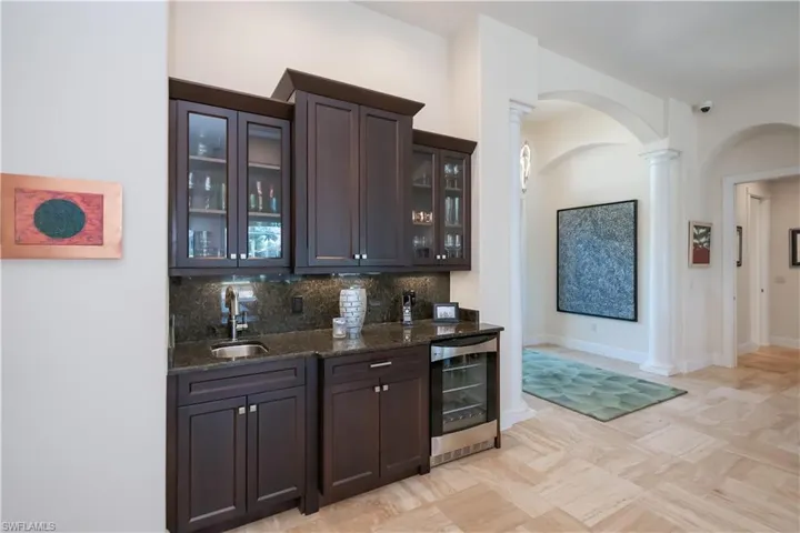 Wet bar with wine refrigerator