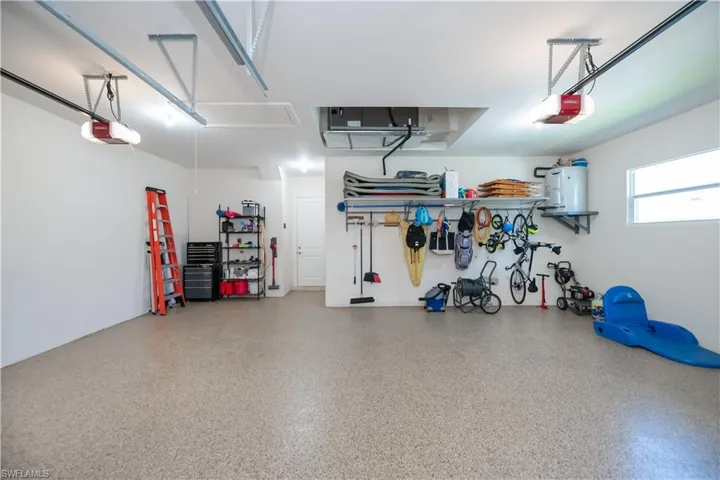 Three car garage with Epoxy Flake Flooring