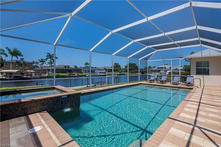 Massive heated pool with spa