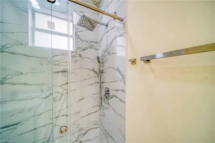 Bathroom featuring walk in shower