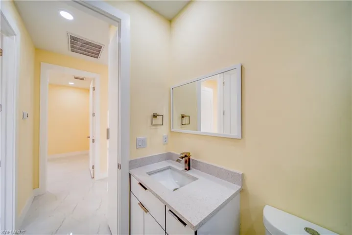 Bathroom with toilet and vanity