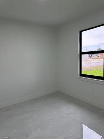 View of tiled spare room