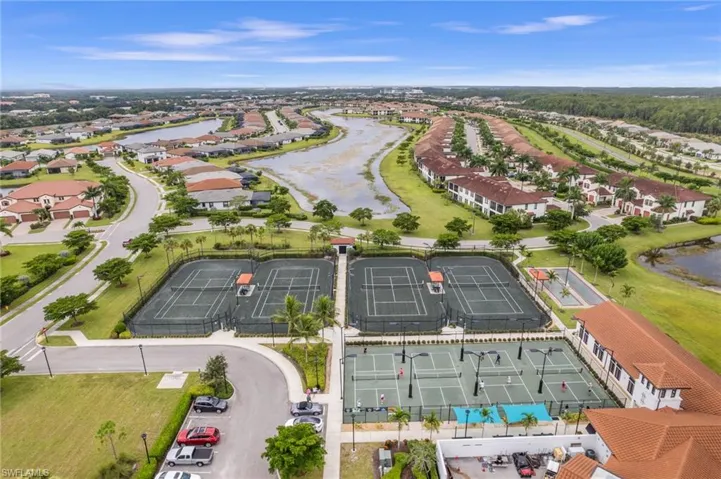 Bird's eye view with a water view and a residential view
