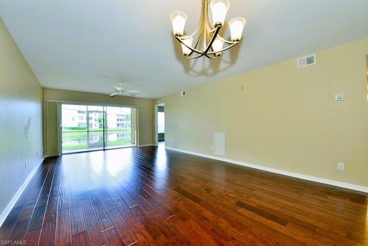 Living spaces flow directly onto the peaceful lakefront lanai