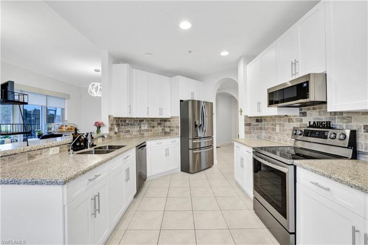 Great counter space-marble brick shape backsplash-roll outs in cabinets