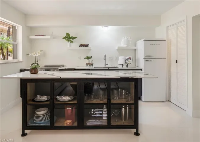 Fully Renovated Kitchen with all new appliances and quartz countertops with In-unit Laundry