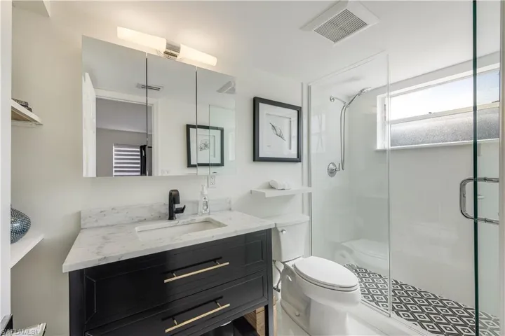 Custom primary shower with Seamless Glass shower doors