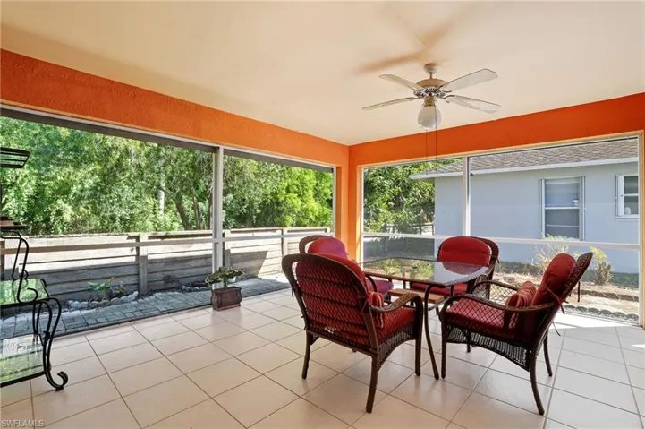 Sunroom featuring tile patterned floors