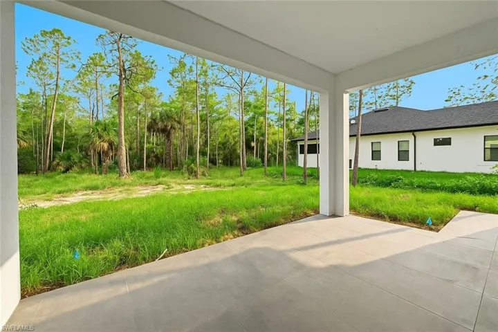 View of yard featuring a patio