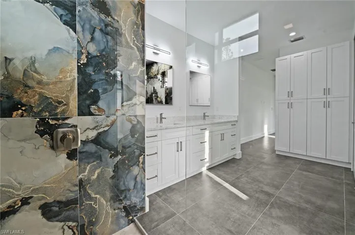 Full bathroom featuring vanity