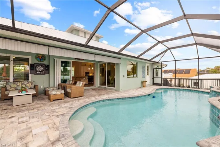 Pool and Back Lanai gathering area under Truss