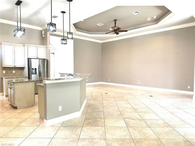 View of Great Room and Kitchen from breakfast room.
