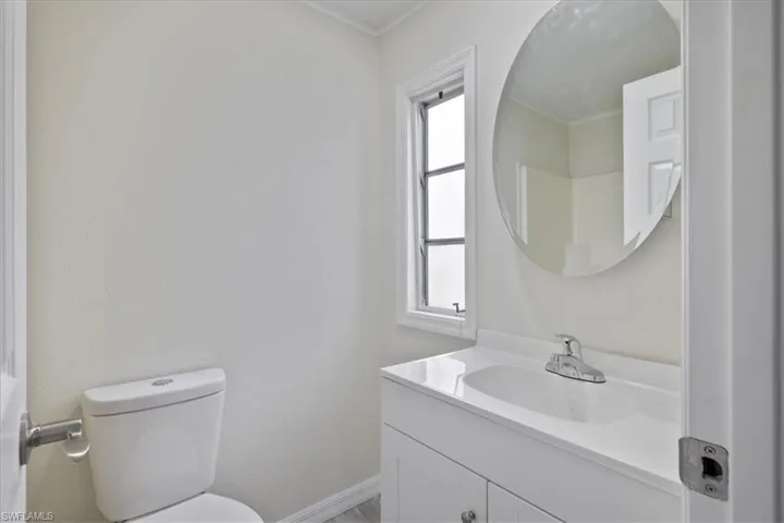 Bathroom with vanity and toilet