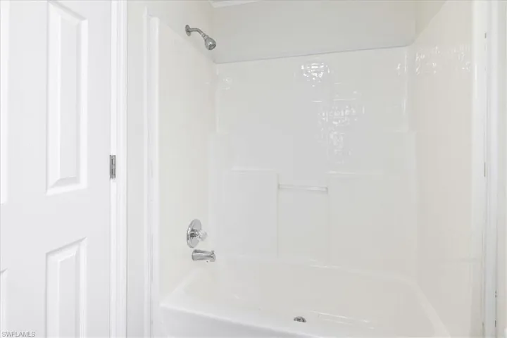 Bathroom with bathtub / shower combination