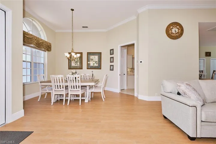 Unfurnished room with light wood-style flooring and a ceiling fan