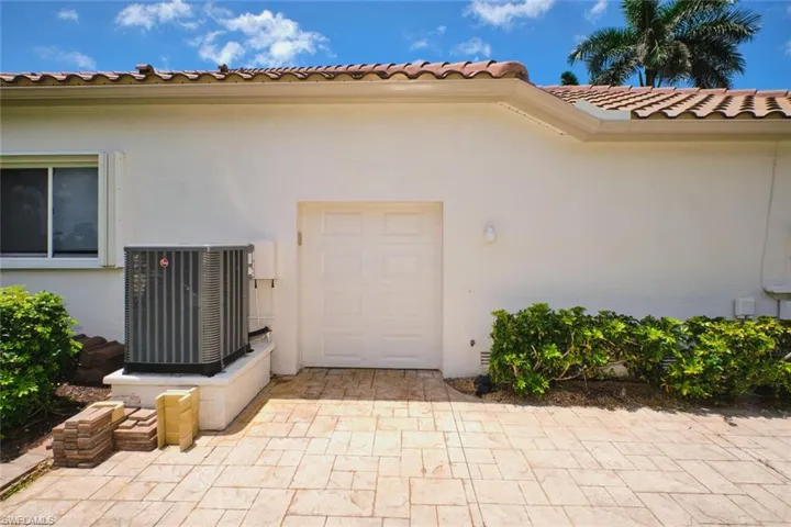 Outdoor pool featuring a ceiling fan, a patio, and a lanai