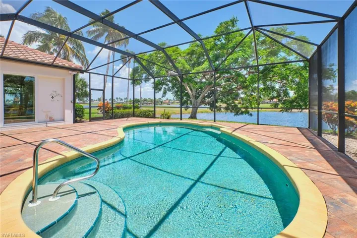 View of patio / terrace with a ceiling fan, outdoor dining area, and glass enclosure