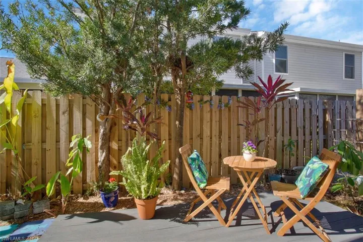 View of fenced backyard