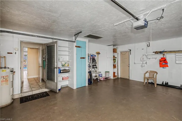 Large Side Load Garage with built in cabinets
