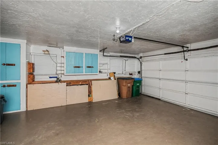 Large Side Load Garage with built in cabinets