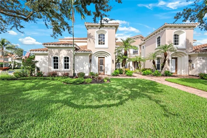 Mediterranean / spanish home featuring a front lawn