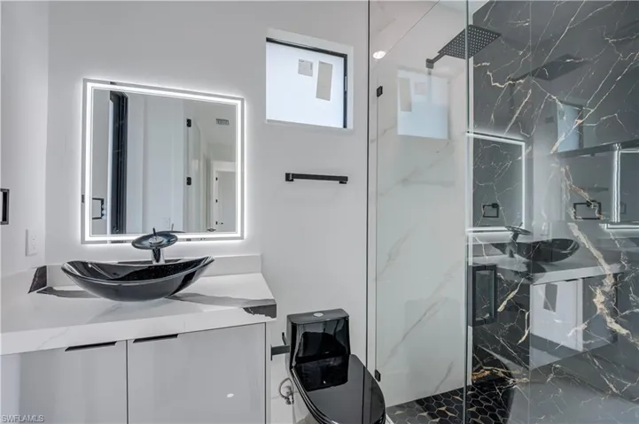 Bathroom connected to Bedroom 2 + Patio