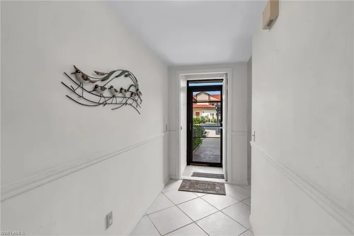 FRONT SCRENED ENTRY - FIRST FLOOR