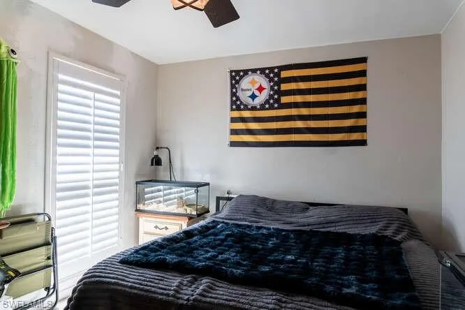 Bedroom featuring ceiling fan