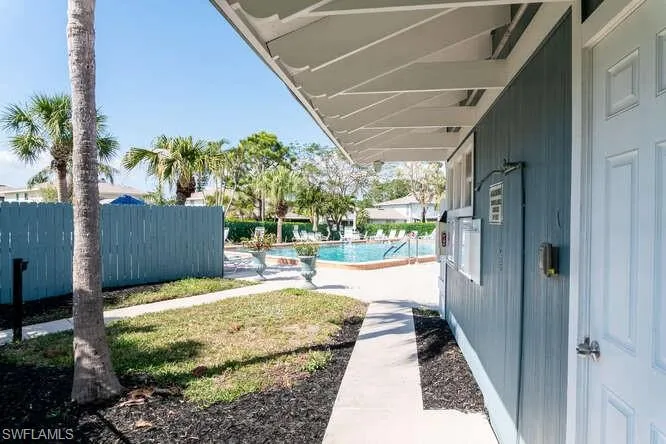 View of yard featuring a community pool
