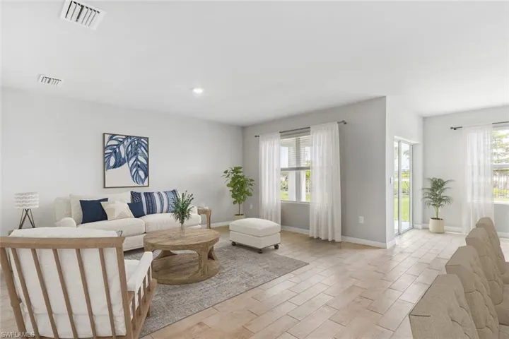 Virtually Staged-Living room featuring healthy amount of natural light