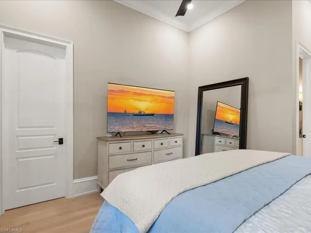 Guest Bedroom with ensuite bathroom and European White Oak wood flooring.