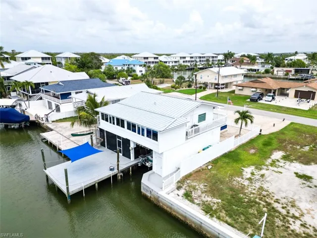 Aerial view of residential area with a nearby body of water