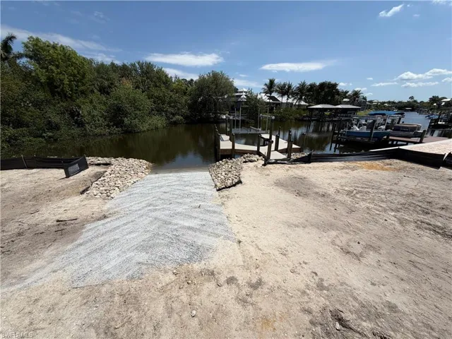 Private 32 ft Boat Ramp and Dock.