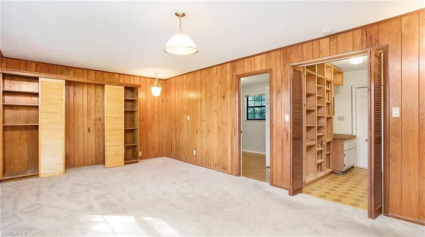 Den/Family RoomBedroom and Laundry entrance shown