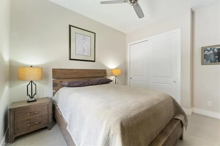 Bedroom featuring a closet and ceiling fan