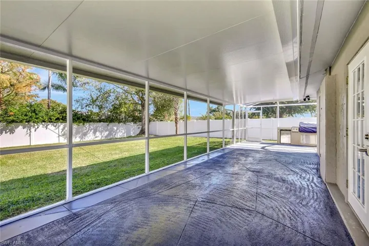 Unfurnished sunroom with plenty of natural light