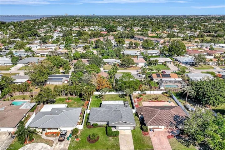 View of property location with nearby suburban area