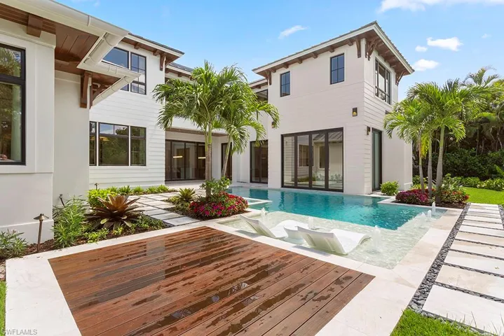 Outdoor pool with a patio area