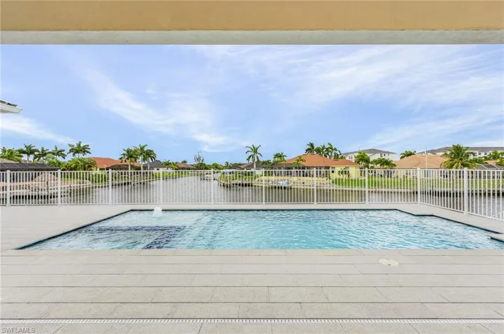 View of pool featuring a water view