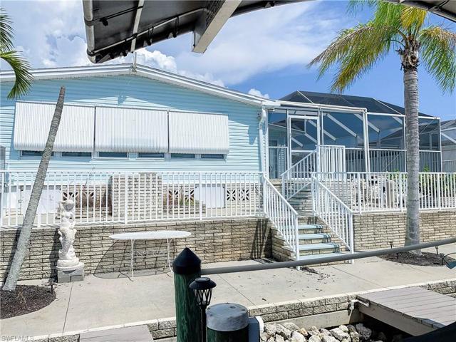 Rear deck, and fenced in patio off pool.