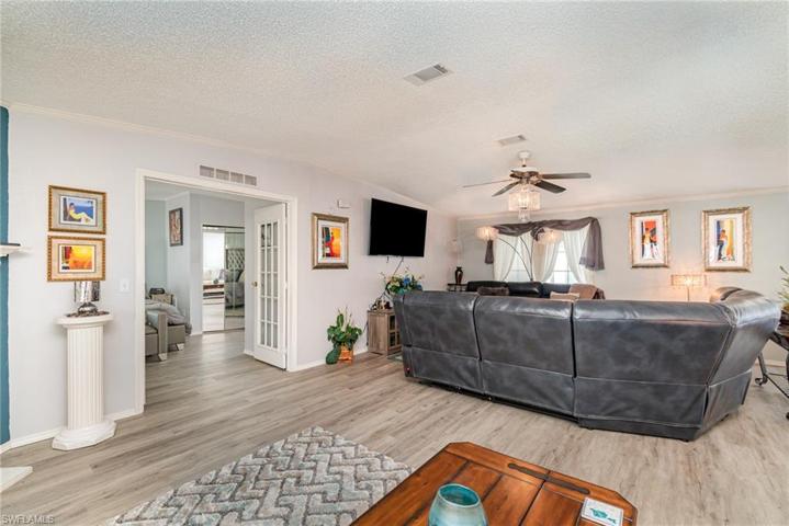 Looking living room into Primary Bedroom