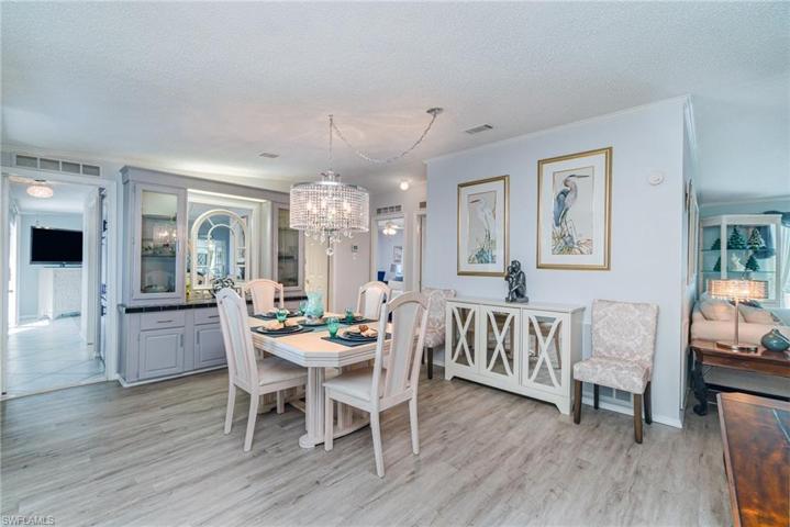 Formal dining area with custom curio