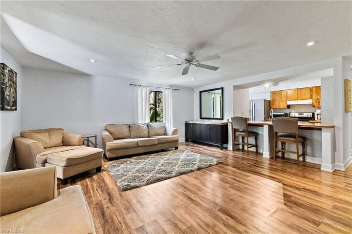 Living room looking into kitchen