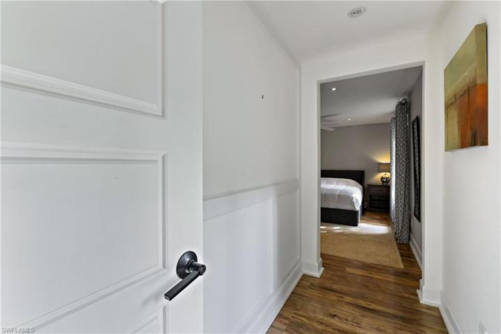 hall leading to primary bedroom