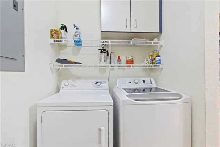 Laundry area featuring independent washer and dryer