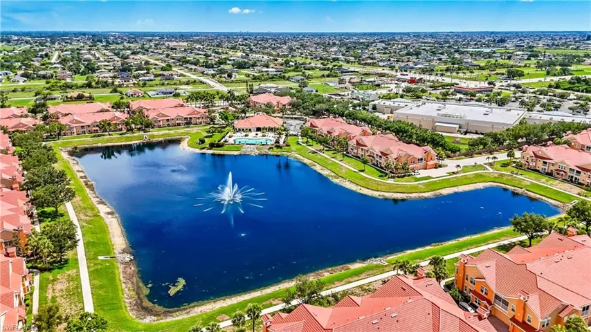 Aerial perspective of suburban area with a large body of water