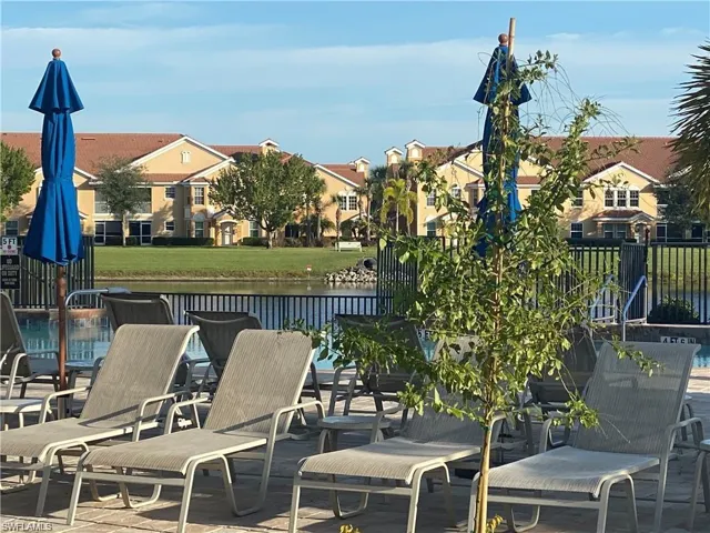 View of patio with a water view and a residential view