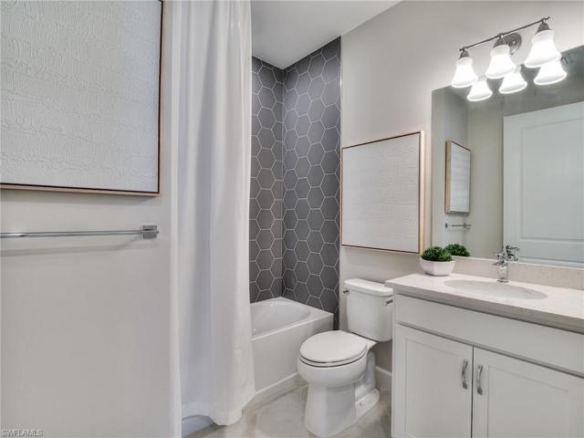 Bath 2 - Photos are from the furnished model. Options for this home may vary