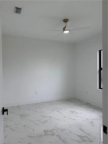 Unfurnished room with ceiling fan